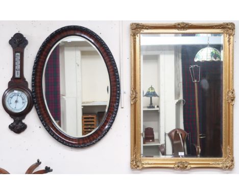 A lot comprising an oak aneroid Barometer/thermometer, Victorian oval wall mirror and a contemporary gilt framed wall mirror 