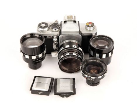 A Wirgin Edixa-Mat Kadett SLR Camera, with three additional lenses and waist level finder (a lot)