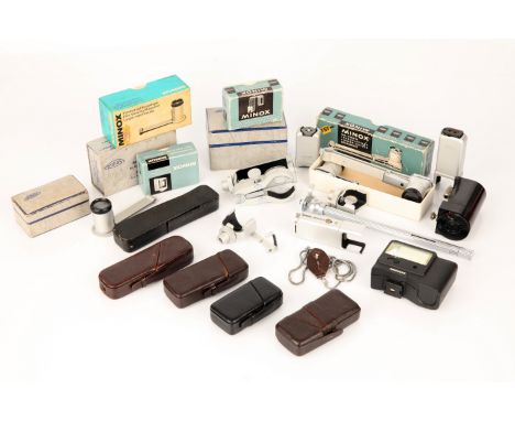 A Selection of Various Minox Accessories, including viewer / cutter, flash units, right angel finder and more, some in maker'
