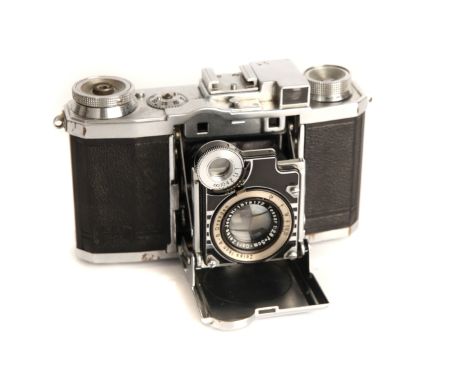 A Zeiss Ikon Super Nettel Camera, chrome, with maker's case