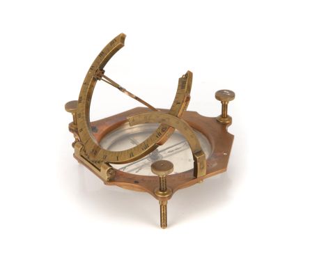 A Large Equinoctial Sundial, mid 19th Century, French, shaped brass base missing bubble levels and having replacement levelli