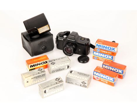 An Asahi Pentax Auto 110 Camera, complete with flash unit and various film (a lot)
