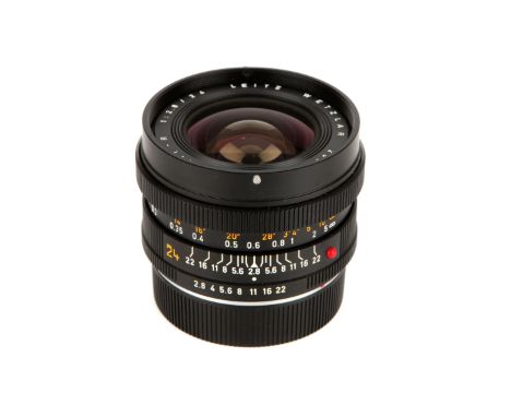 A Leitz Elmarit-R f/2.8 24mm Lens, 1977, black, serial no. 2834281, body, VG, elements, G-VG, some light internal haze, with 