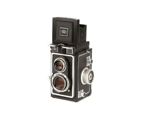 A Zeiss Ikon Ikoflex Ic (886/16) TLR Camera, 1956-60, black, serial no. 7333, with Novar Anastigmat f/3.5 75mm lens, body, VG