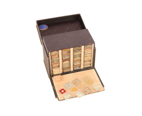 A Collection of Belgian Microscope Slides in a Faux Leather Case, with fold down front and lift up top, gold lettering to top