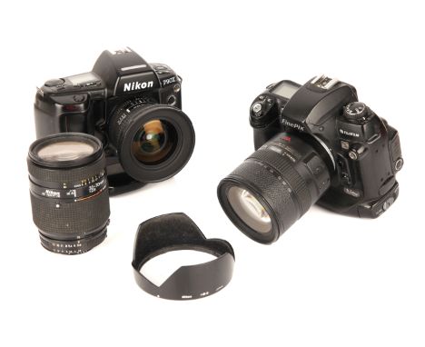 A Nikon F90x Film SLR Camera, with AF Nikkor D f/2.8 18mm lens, together with a Fujifilm S3 Pro and two other lenses (a lot)