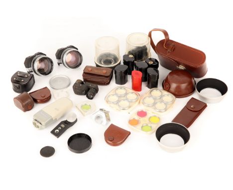 A Selection of Various Zeiss Ikon Accessories, including lens hoods, filters, lens adapters and more (a lot)