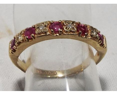 A lady's 9 carat gold hallmarked half eternity ring, size J and a half, boxed, approximate weight 1.7 grams
