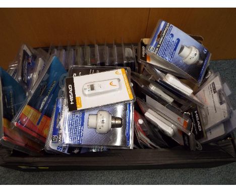 Unused retail stock - a selection of unused retail stock in sealed blister packs to include video modulators, digital alcohol