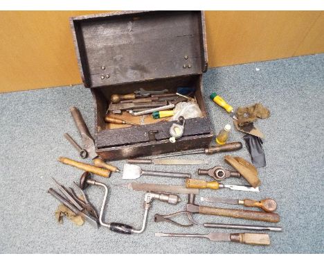 A tool box containing a good collection of wood working tools and similar
