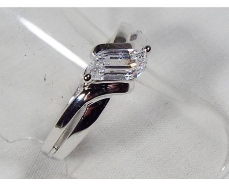 A lady's 9 carat white gold solitaire ring, approx weight 2.3 gm, size M  - Est £30 - £40
