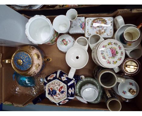 A good mixed lot of ceramics to include shaving mugs, steins, bud vases, a ceramic table lighter by Collbry, included in the 