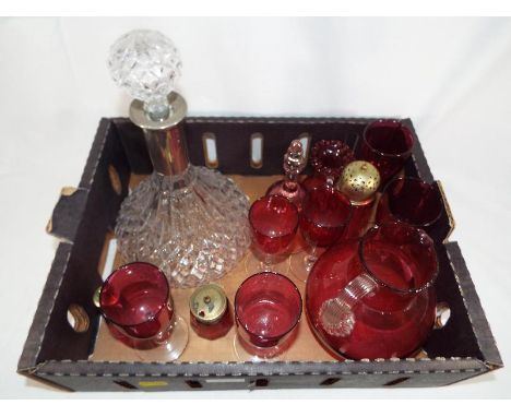 A good quality ship's decanter with white metal collar and a collection of Cranberry glass