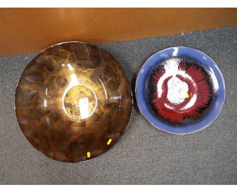 A large art glass bowl approximately 11 cm (h) x 52 cm (d) and a ceramic bowl glazed with an abstract pattern 5.5 cm (h) x 40