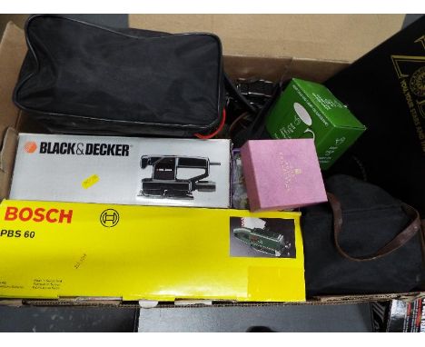 A mixed lot to include a Bosch PBS 60 belt sander, a Black and Decker sander , vintage cameras and other 
