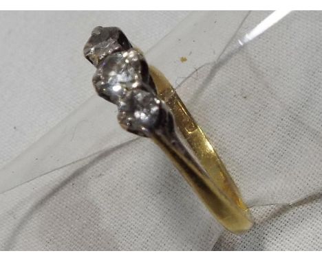 A lady's 18ct platinum diamond trilogy ring approximate weight 1.66 grams (all in)  
