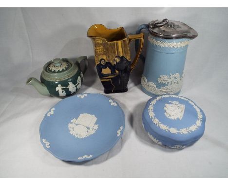 A good mixed lot of Jasperware to include a blue and white jug decorated with a hunting scene with horses and hounds with a w