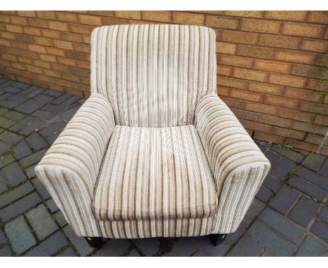 A modern armchair retailed by Next, Oslo light natural finish with original sales receipt ca 2013, however nominal use only