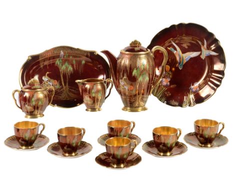  A Carlton Ware Rouge Royale coffee set  , circa 1930, comprising: a coffee pot and cover; a sugar box and cover; a cream jug