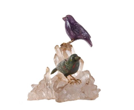  A rock crystal, amethyst and bloodstone bird ornament,   the carved amethyst and bloodstone birds perched on a rock crystal 