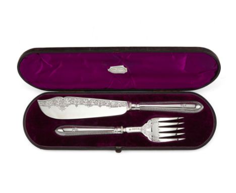  A pair of Victorian silver fish servers by Atkin Brothers,   Sheffield  1880,  the handles bearing maker's mark W.M, engrave