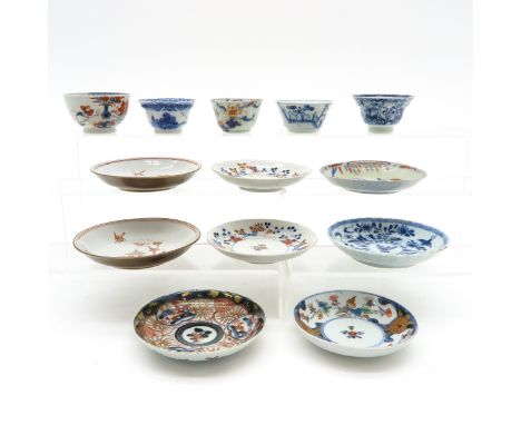 Including 5 cups and 8 saucers, saucers are 12 cm. in diameter, chip en hairline.