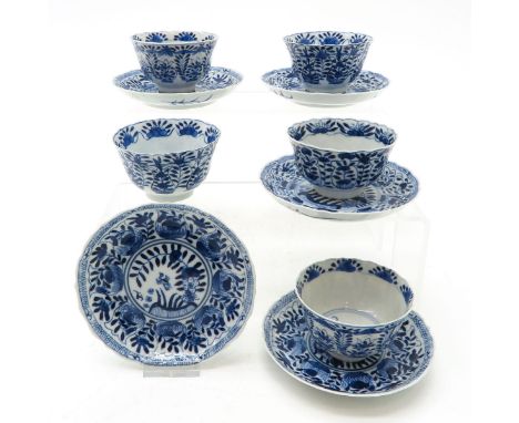 Saucers are 13 cm. in diameter, marked with double ring and 4 characters, chip.