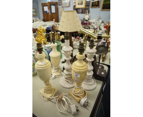 THREE MARBLE ELECTRIC TABLE LAMPS AND A PAIR OF CARVED WOODEN TABLE LAMPS (5) OAK NAPOLEONS HAT SHAPED MANTEL CLOCK, AN ANERO