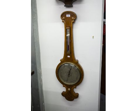 A LATE VICTORIAN WALNUTWOOD BANJO BAROMETER AND THERMOMETER WITH ENGRAVED SILVERED DIAL, 3'6" HIGH 