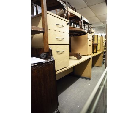 A LIGHT OAK TABLE DESK, ON END PANEL SUPPORTS, 5'3" X 2'8" AND A FREE  STANDING PEDESTAL ALONGSIDE WITH TWO SHALLOW AND ONE D