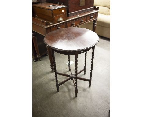 EARLY TWENTIETH CENTURY MAHOGANY CIRCULAR OCCASIONAL TABLE WITH SIX SPIRAL TURNED SUPPORTS WITH RADIATING SIX SPODE/CARTWHEEL