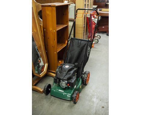 A MODERN PETROL DRIVEN ROTARY LAWN MOWER (AS NEW) 