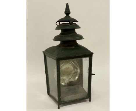 A 19th century green painted station wall lantern, bearing Pitter &amp; Sons metal label, fiinial on triple circular vents, t