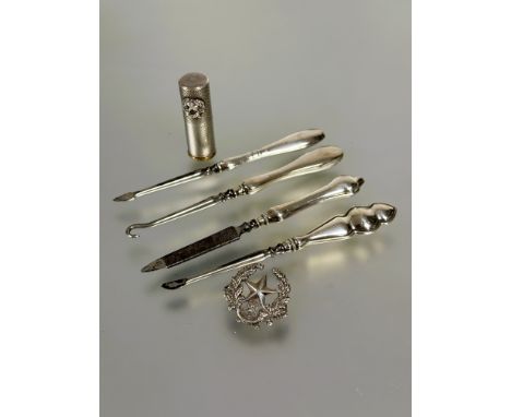 A Edinburgh silver Cameronians Scottish Rifles cap badge and white metal engine turned lipstick case with matching insignia H