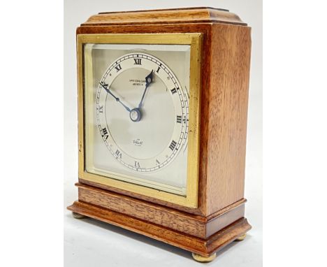 An Elliott mantle clock, retailed by Jamieson &amp; Carry of Aberdeen, with roman numeral indices and heat blued hands (h- 15