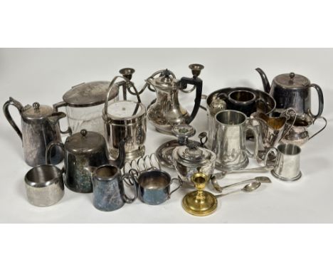 A large collection of Epns ware to include a chamber candle stick, hotel ware tea, coffee, hot water jugs, toast rack, servin