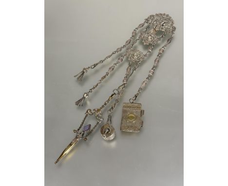 A Edwardian Birmingham silver Chatelaine the pierced top with cherubs above two panels with heart shaped panels with five cha