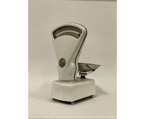 A Vintage set of shop scales, circa 1960's, white enamelled cast iron with makers badge to each side. H54cm.&nbsp;