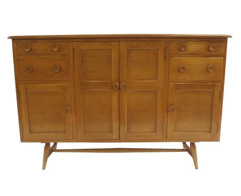 AN ERCOL SIDEBOARD with two cupboard doors flanked by two drawers over cupboard door, 86cm x 129cm x 49cm Condition Report: A