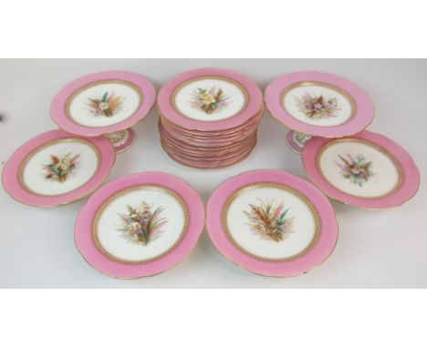 A ROYAL WORCESTER DESSERT SERVICE comprising; twelve plates, two tazzas and four shorter examples, each with a pink border an