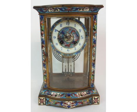 A FRENCH CHAMPLEVE ENAMEL MANTLE CLOCK the dial with white enamelled chapter ring and Arabic numerals, the case marked 217 an