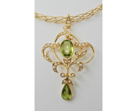 A 15CT GOLD PEARL AND PERIDOT EDWARDIAN PENDANT BROOCH on an 18ct gold modern four strand woven pearl set chain, length of pe