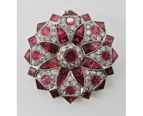 AN ART DECO STYLE FAUX RUBY AND DIAMOND PENDANT BROOCH craftsman made in white metal estimated approx diamond content 1ct, di