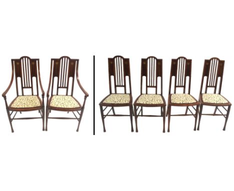 A SET OF SIX GLASGOW STYLE STAINED DINING CHAIRS with mother of pearl inlay, two carvers 102cm high and four chairs 97cm high