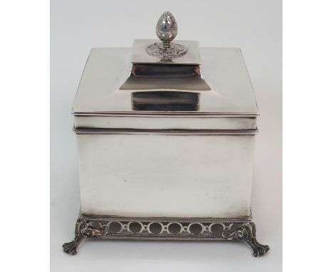 A SILVER TEA CADDY by James Dixon & Sons, Sheffield 1918, of square shape, the hinged cover with pineapple finial, the plain 