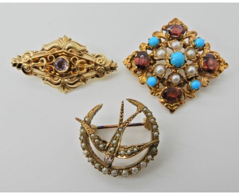 THREE 9CT BROOCHES a swallow set with pearls and a diamond, 2.3cm, weight 4.7gms, a medieval style brooch set with garnets, t