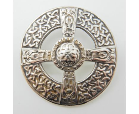 A SILVER ALEXANDER RITCHIE CELTIC CROSS BROOCH stamped Prioress Anna Iona, with knotwork borders, baring Alexander Ritchie 's