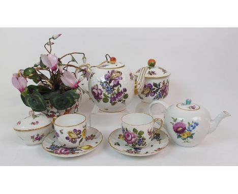 A COLLECTION OF CONTINENTAL PORCELAIN including a teapot, a pair of cups and saucers, a sucrier and cover and other items all