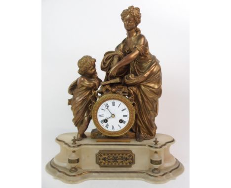 A CONTINENTAL ALABASTER AND ORMOLU MOUNTED MANTLE CLOCK depicting mother and child, the white enamel dial with Roman numerals