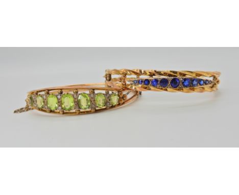 TWO 9CT GOLD VINTAGE BANGLES a 9ct gold faux peridot and diamond bangle, 1.3cm x 5.8cm, weight 9.9gms, together with a 9ct go